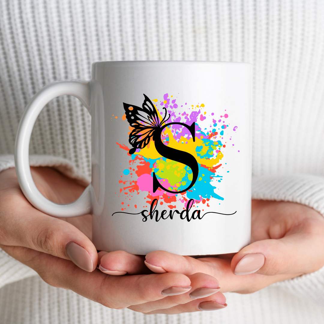 Colour splash monogram mug with butterfly accent