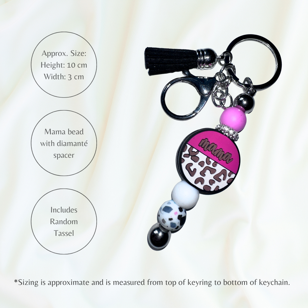 Pink silicone beaded keychain with mama focal bead. 